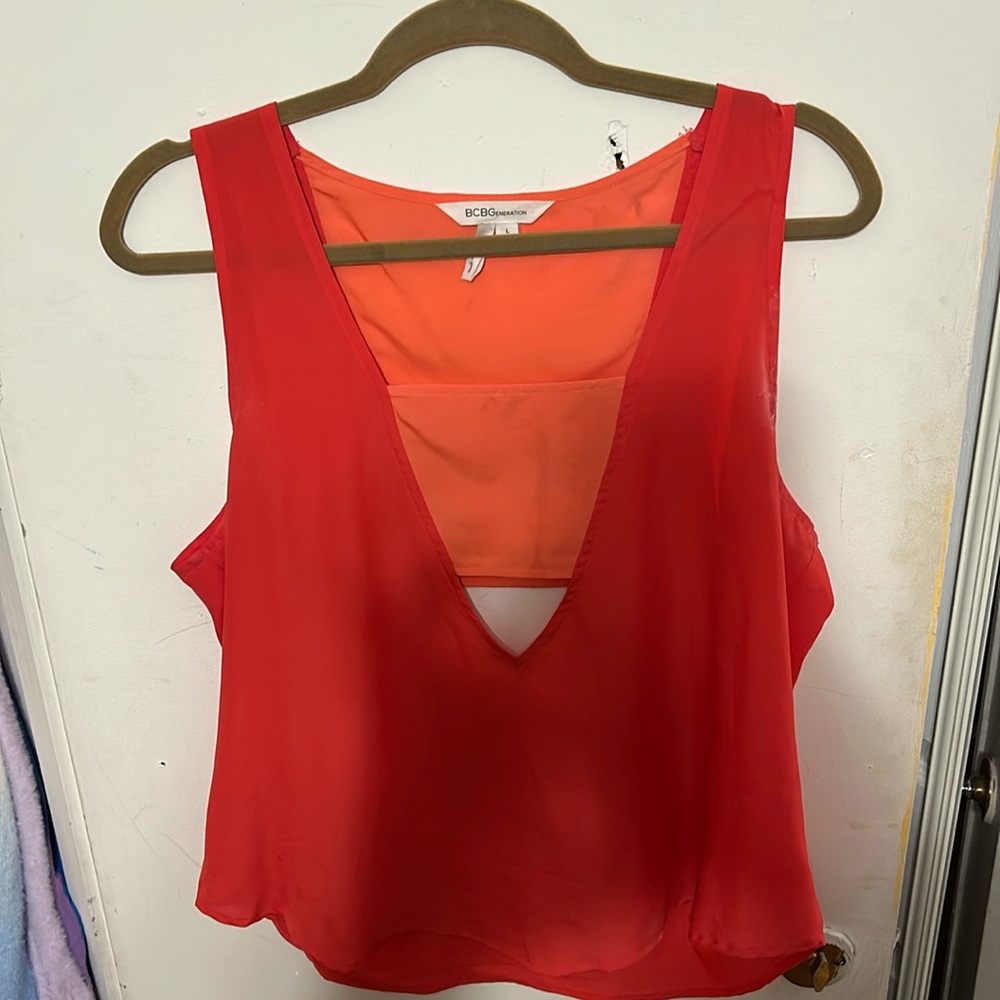 BCBGeneration, Size L, sleeveless pink & coral blouse with cutouts